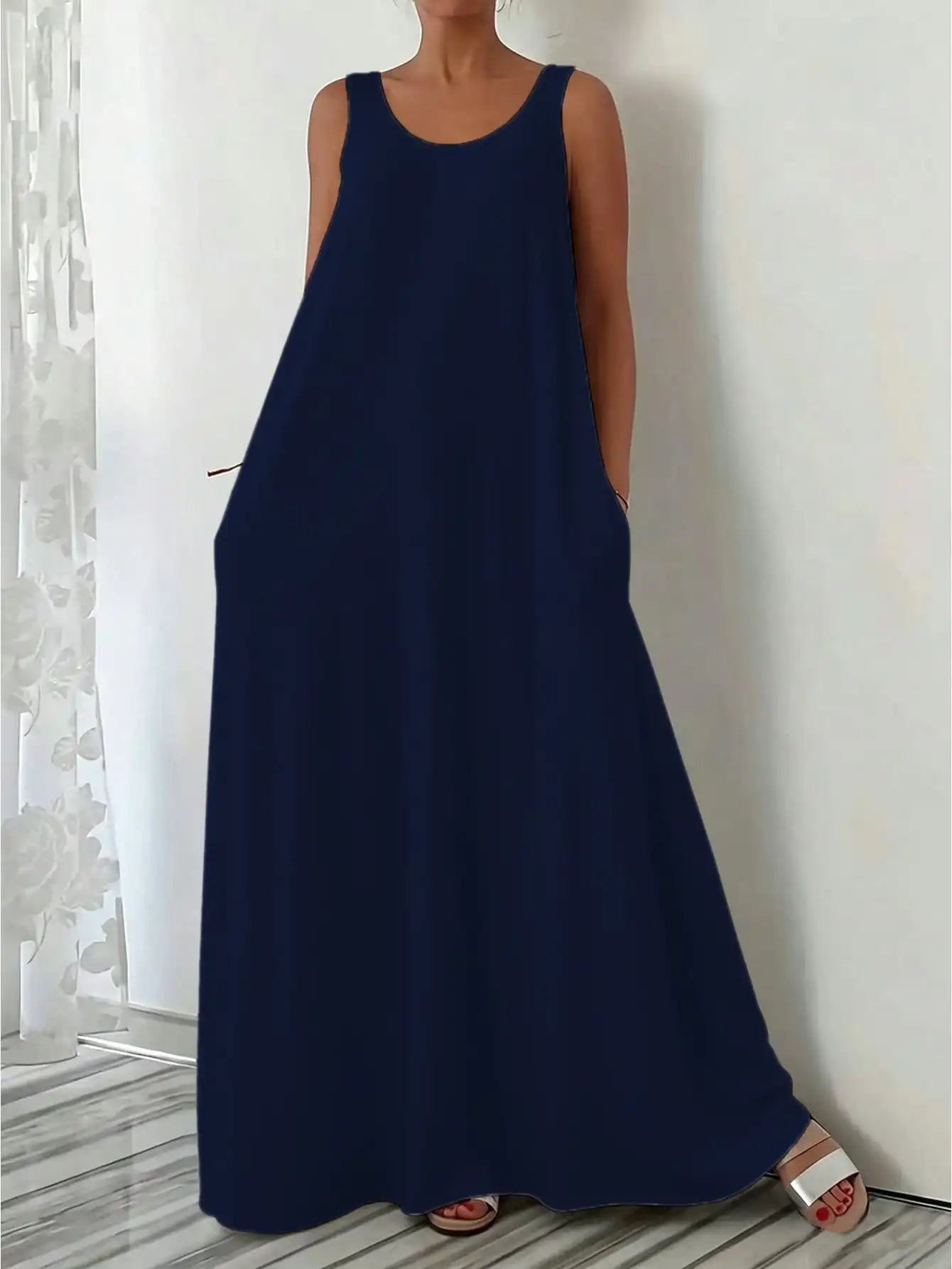 European and American new style casual fashion sleeveless loose pure color dress for women